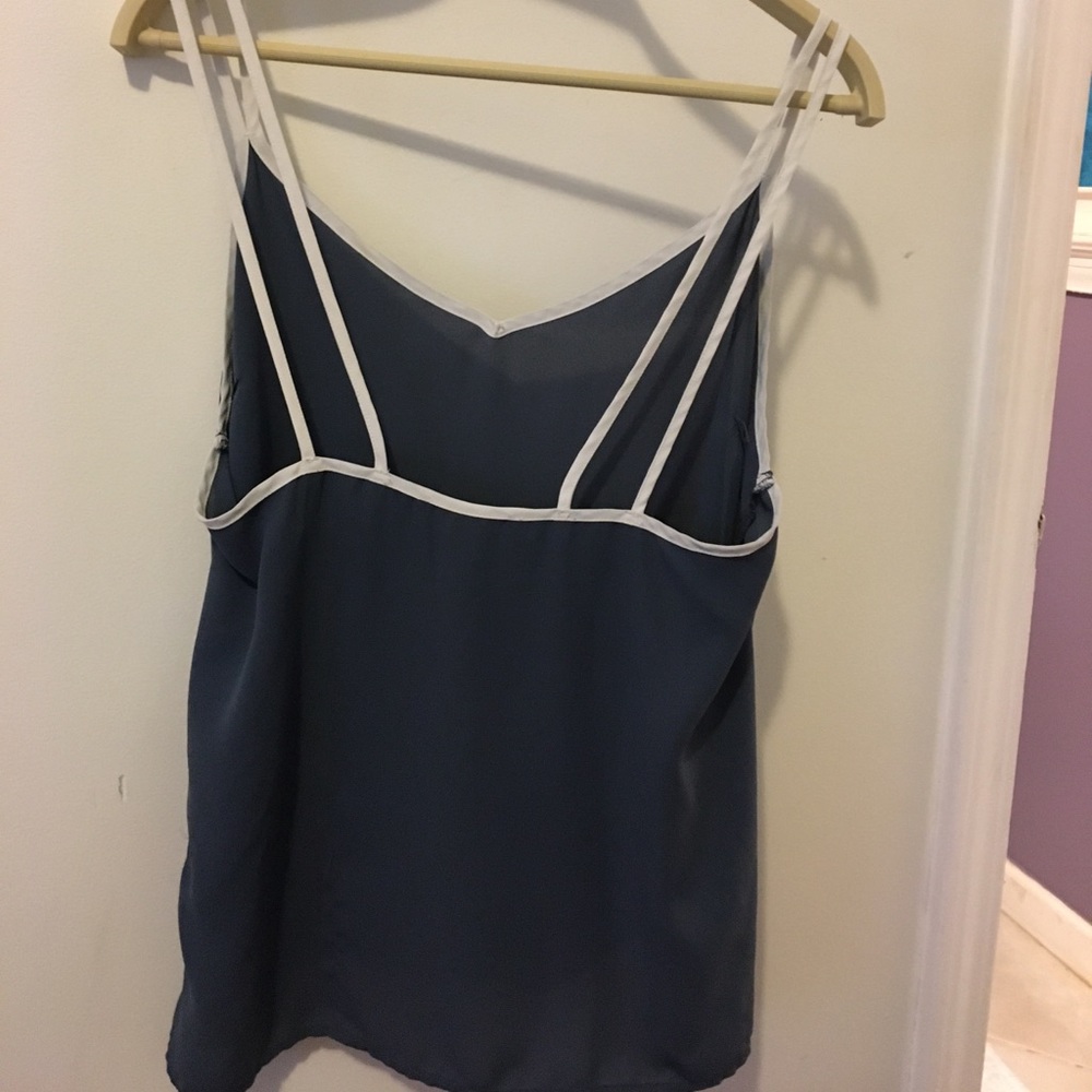 Blue tank with white straps